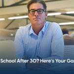A mature student looking at the computer and learning business degree in Canada - How to Prepare for University as a Mature Student